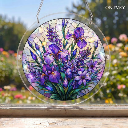 Purple Flower puzzle suncatcher hanging in a window with a garden behind it