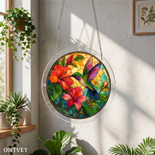 Hummingbird acrylic puzzle suncatcher hanging by a sunny window