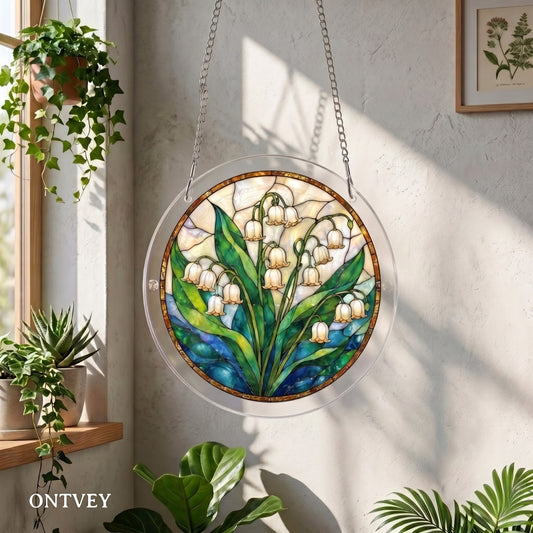 Lily of the Valley acrylic puzzle suncatcher hanging by a sunny window