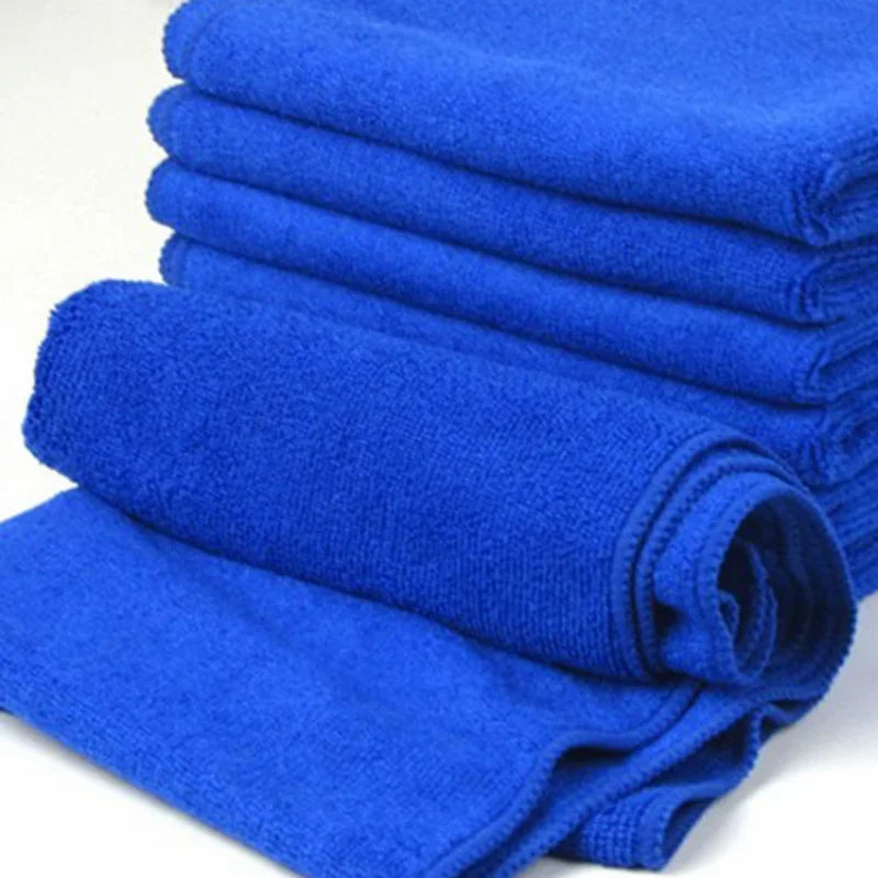 Stack of soft blue microfiber cloths up close
