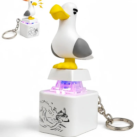 Seagull clicker keychain with a glowing purple key switch and metal keyring