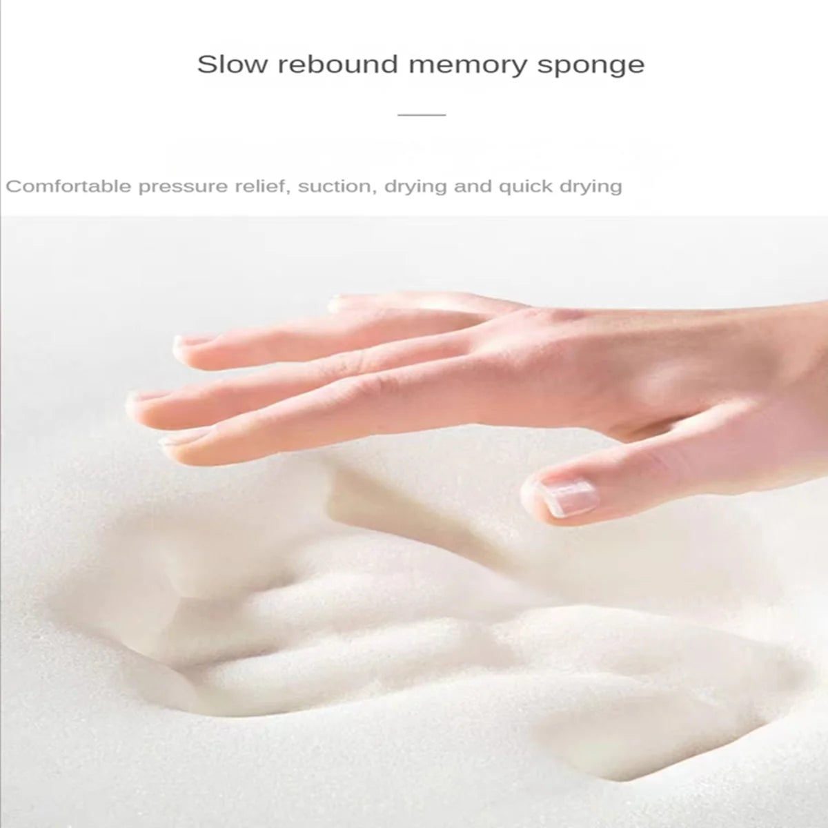 Hand pressing into the soft memory foam of the cobblestone bath mat