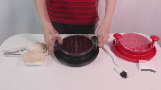 Video of the chicken shredder: twisting the clear lid to shred cooked chicken