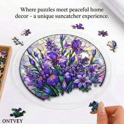 Hands assembling the Purple Flower acrylic jigsaw puzzle suncatcher on a table
