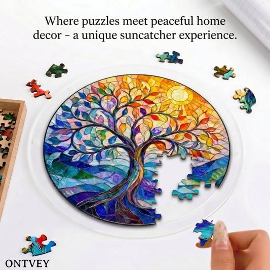 Hands assembling the Vivid Tree acrylic jigsaw puzzle suncatcher on a table